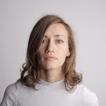 Woman in White Turtleneck Shirt